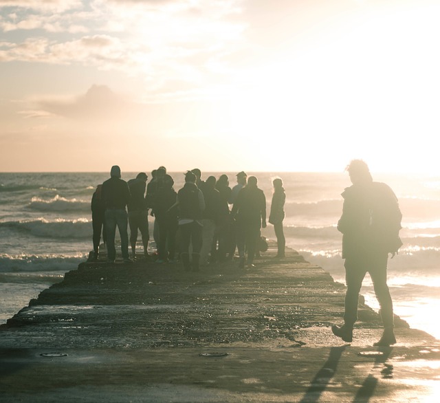 A group of people on a pier