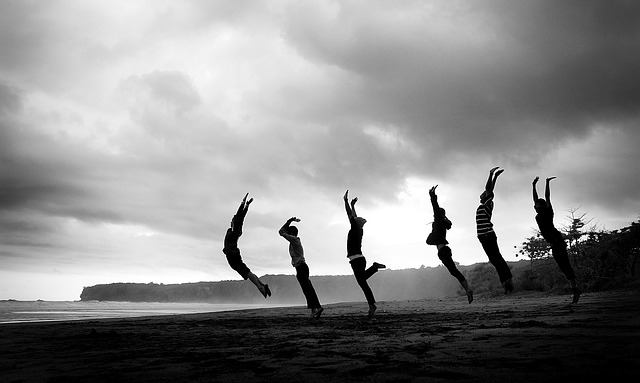 People jumping on the beach