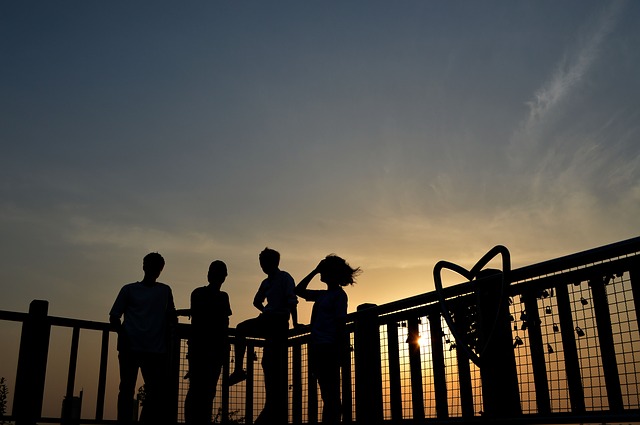 A group of friends in the sunset