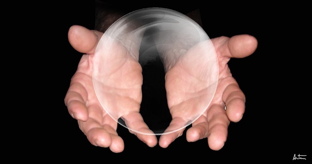 Someone holding a crystal ball